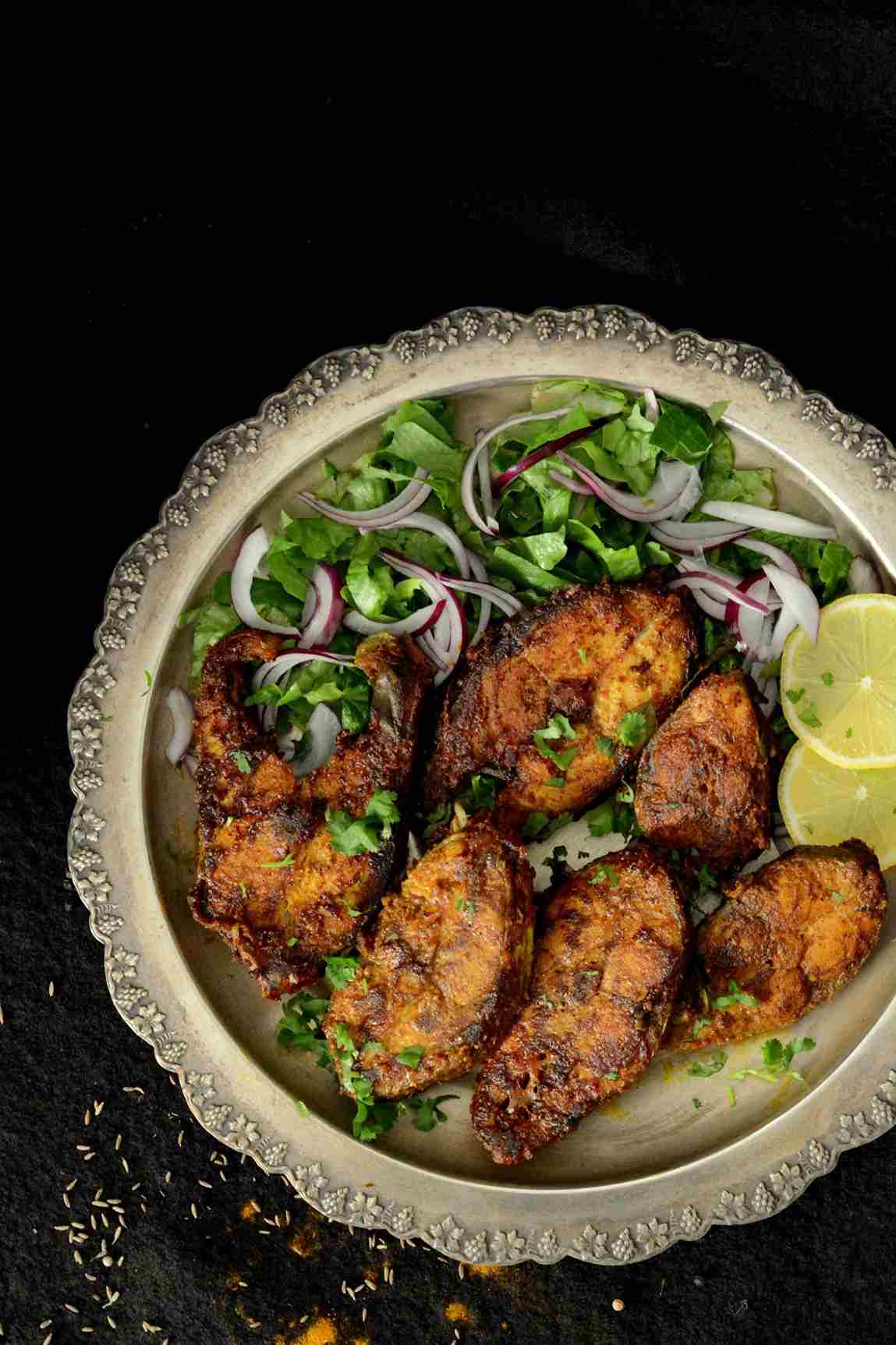 Spicy fish curry on plate